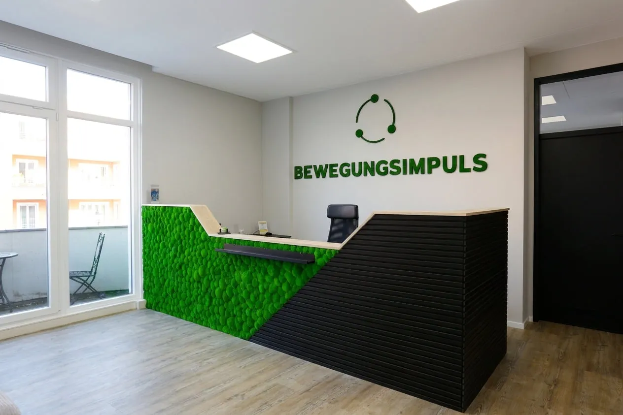 Reception desk with living moss wall