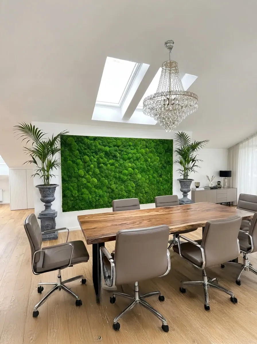 Boardroom with moss wall and crystal chandelier